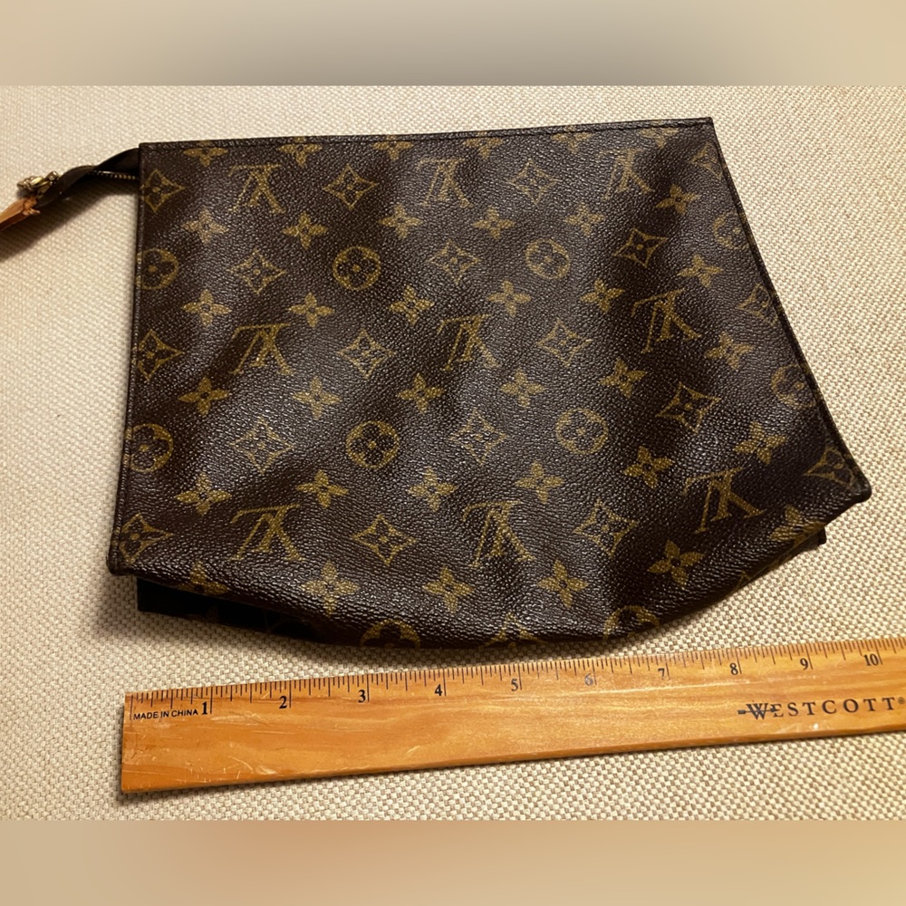 Vintage Louis Vuitton clutch